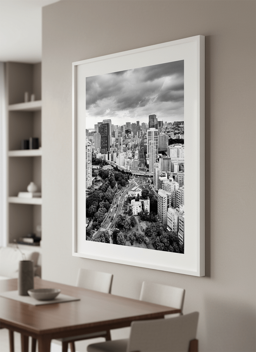 Wall art styled above a dining table in a contemporary home