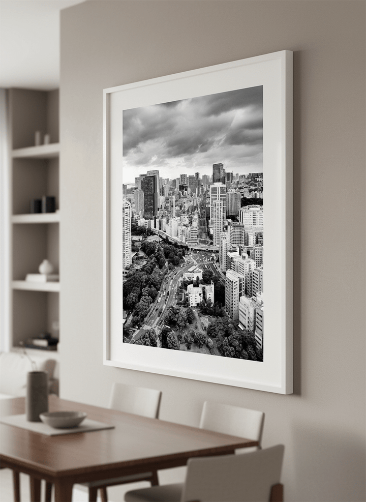 Wall art styled above a dining table in a contemporary home
