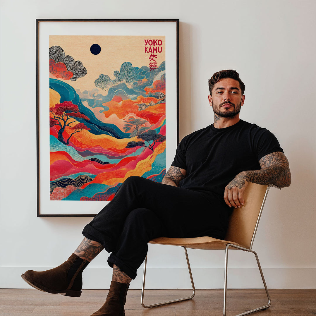 Man sitting on a chair in front of a colorful abstract painting with 'Yoko Kuru' text.