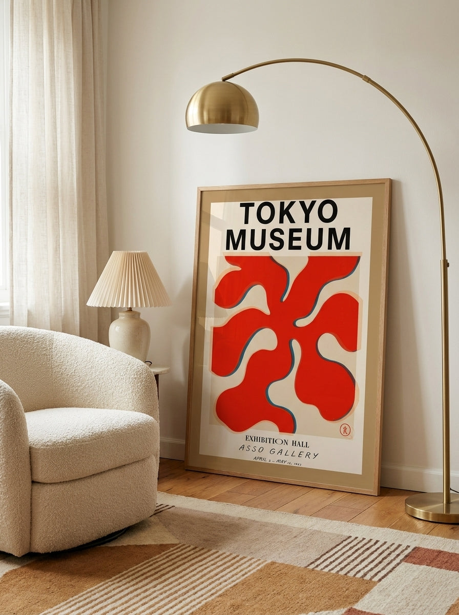 Modern wall art print leaning against the wall in a mid-century bedroom