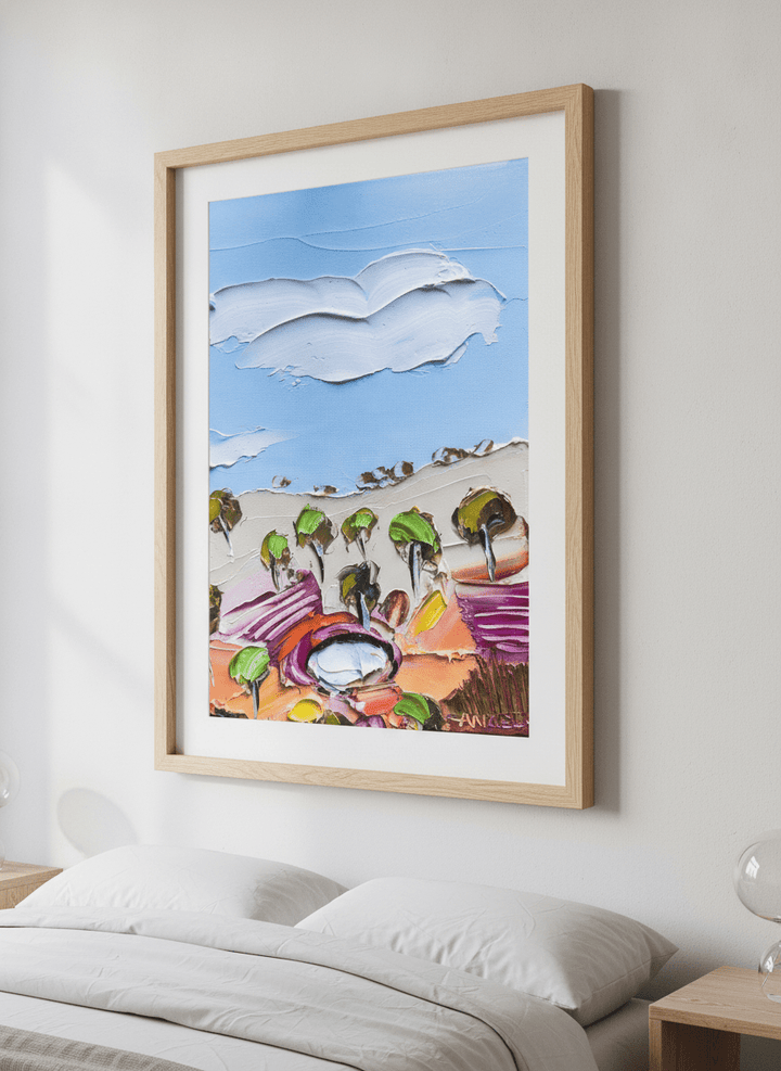 Minimalist artwork displayed in a calm, light-filled bedroom interior