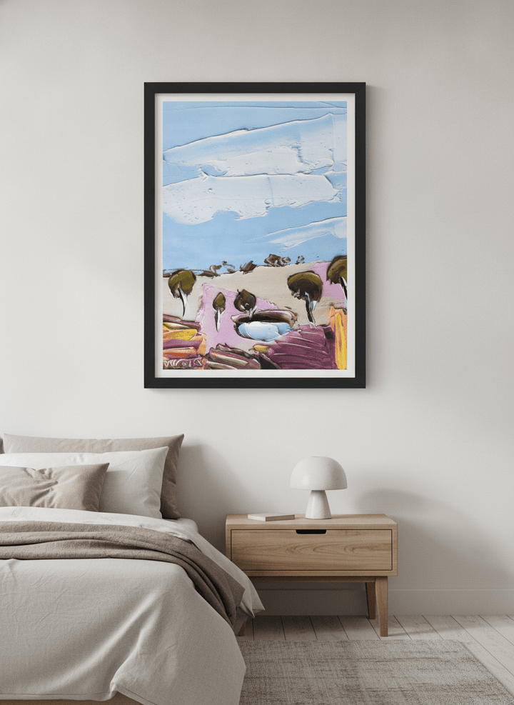 Minimalist artwork displayed in a calm, light-filled bedroom interior
