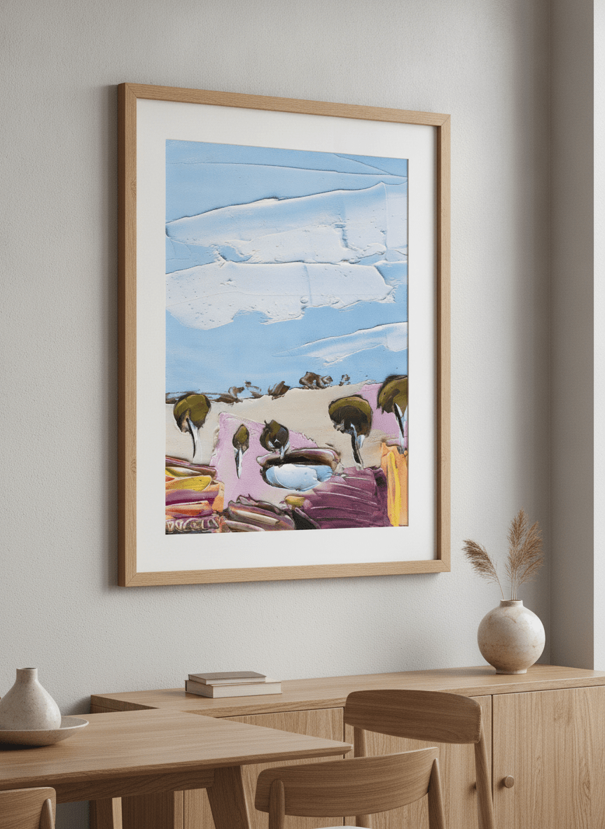 Wall art styled above a dining table in a contemporary home