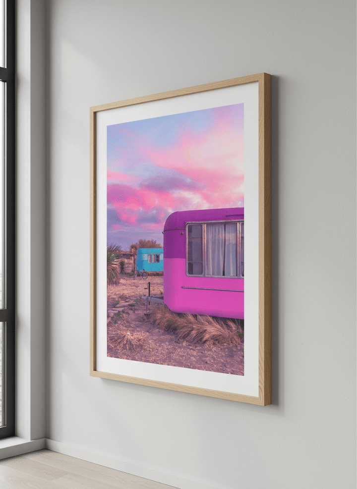 Minimalist artwork displayed in a calm, light-filled bedroom interior