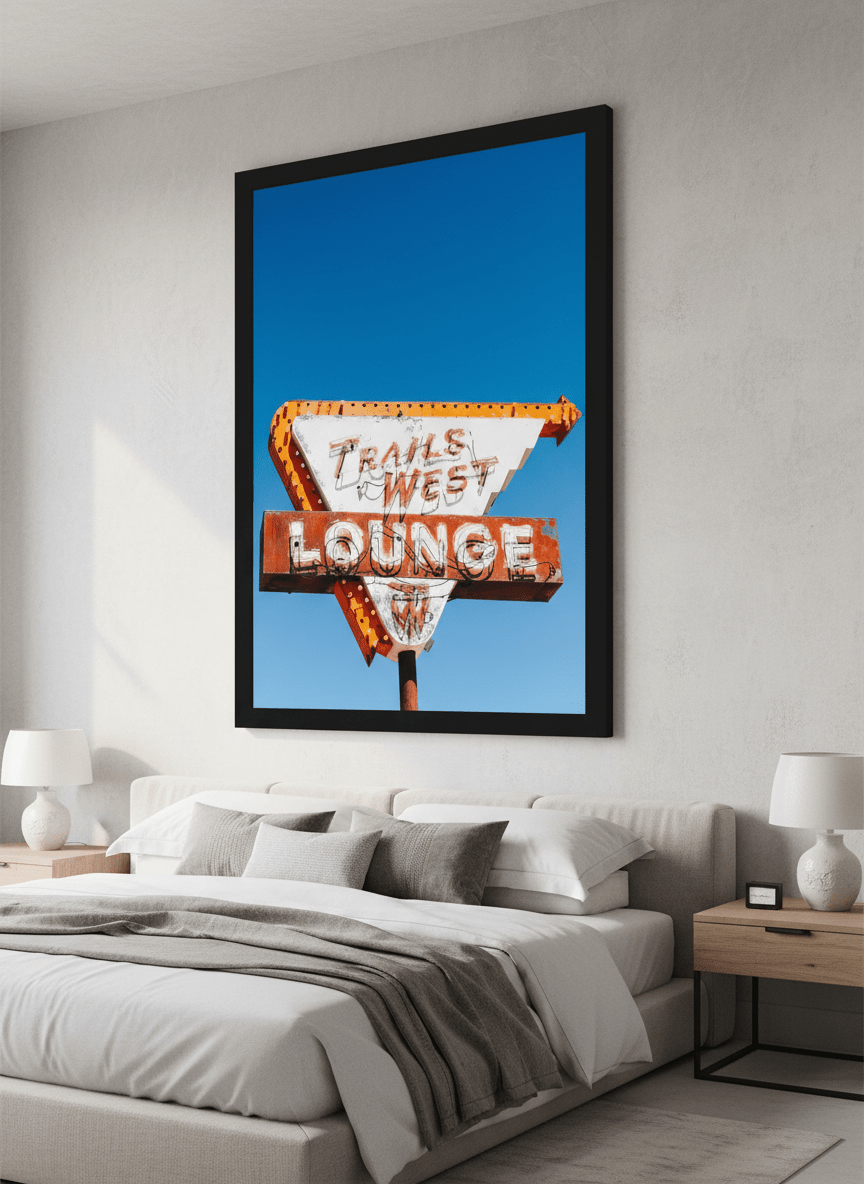 Minimalist artwork displayed in a calm, light-filled bedroom interior