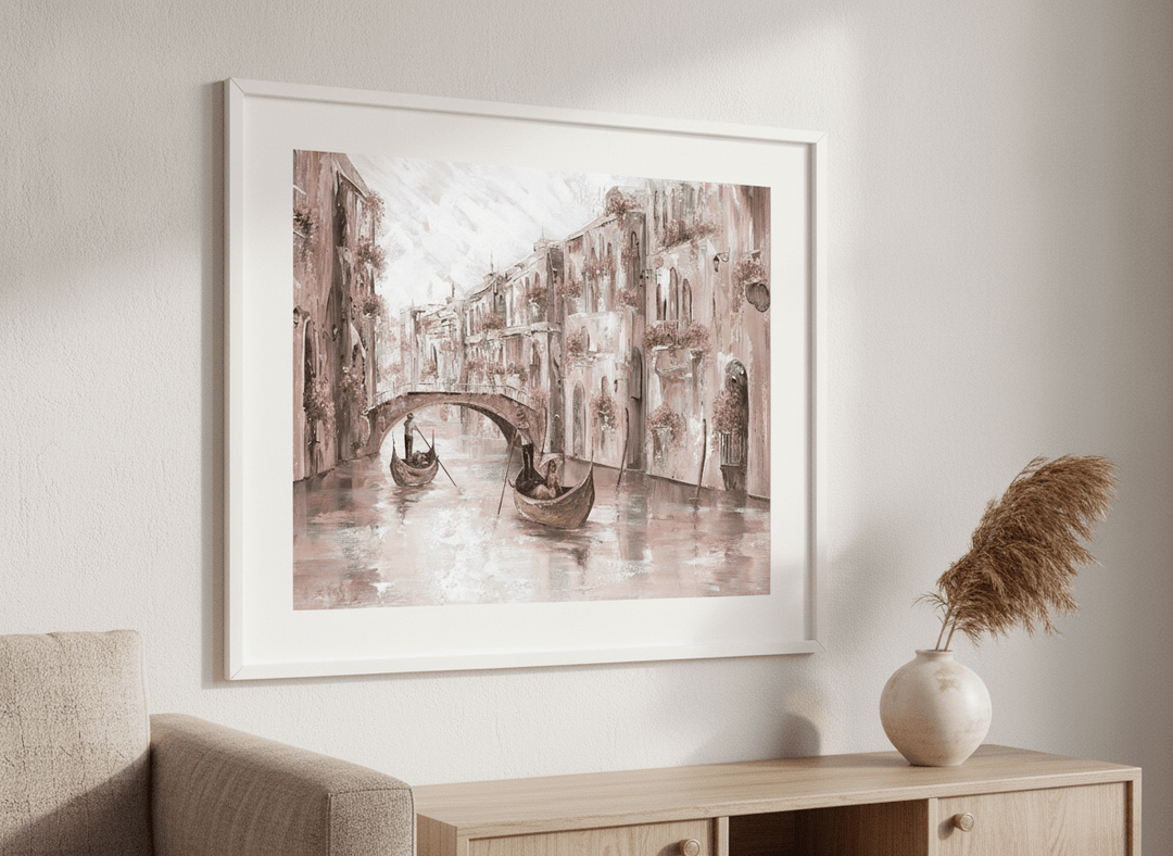 Modern wall art styled above a sofa in a neutral living room