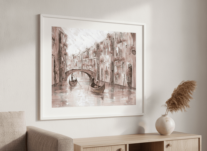 Modern wall art styled above a sofa in a neutral living room