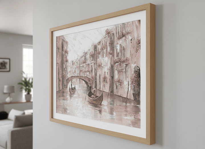 Modern wall art styled above a sofa in a neutral living room