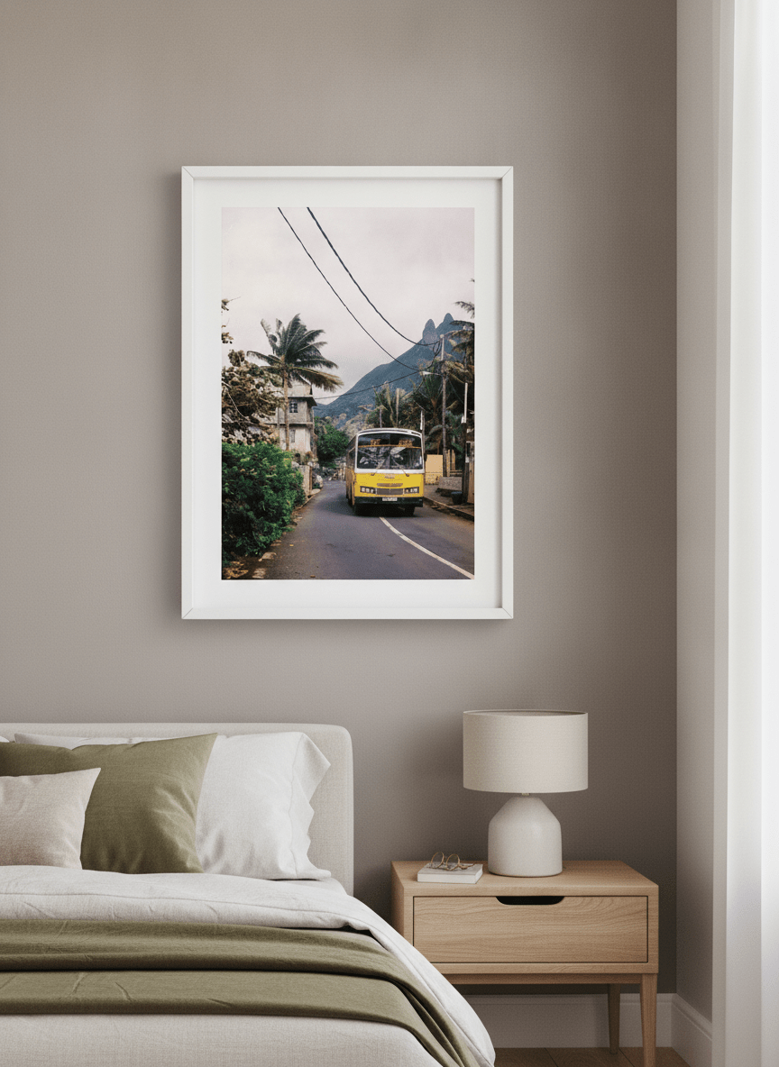 Minimalist artwork displayed in a calm, light-filled bedroom interior