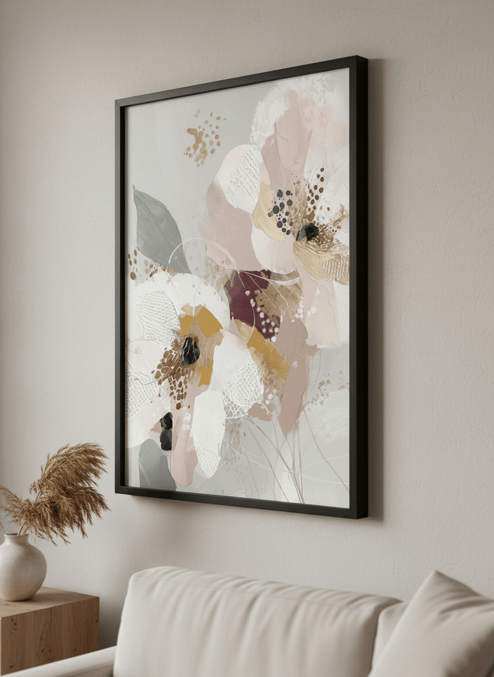 Modern wall art styled above a sofa in a neutral living room