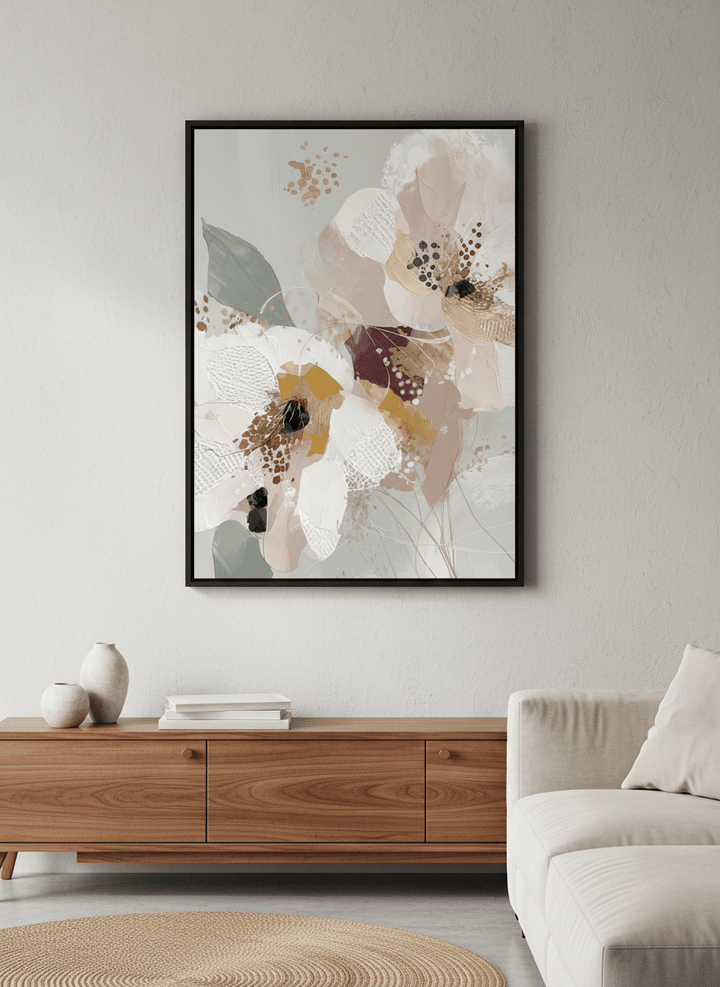 Modern wall art styled above a sofa in a neutral living room