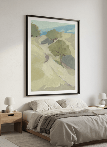 Minimalist artwork displayed in a calm, light-filled bedroom interior
