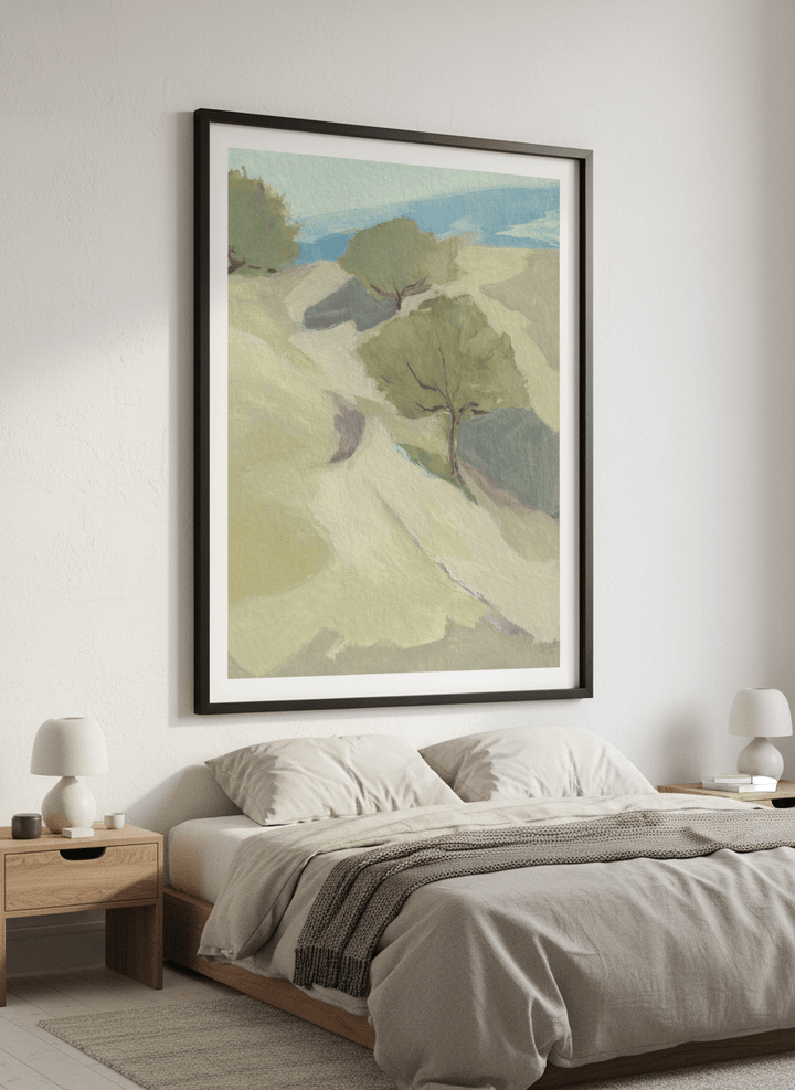 Minimalist artwork displayed in a calm, light-filled bedroom interior