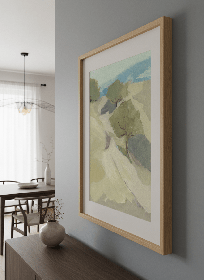 Wall art styled above a dining table in a contemporary home