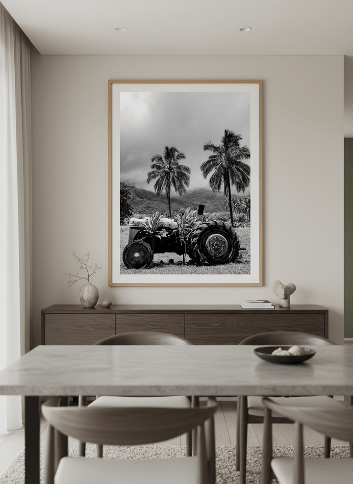 Wall art styled above a dining table in a contemporary home