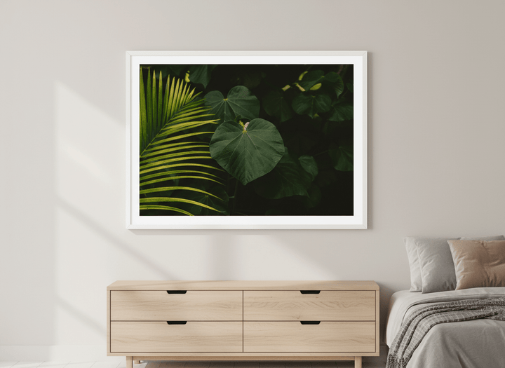 Minimalist artwork displayed in a calm, light-filled bedroom interior