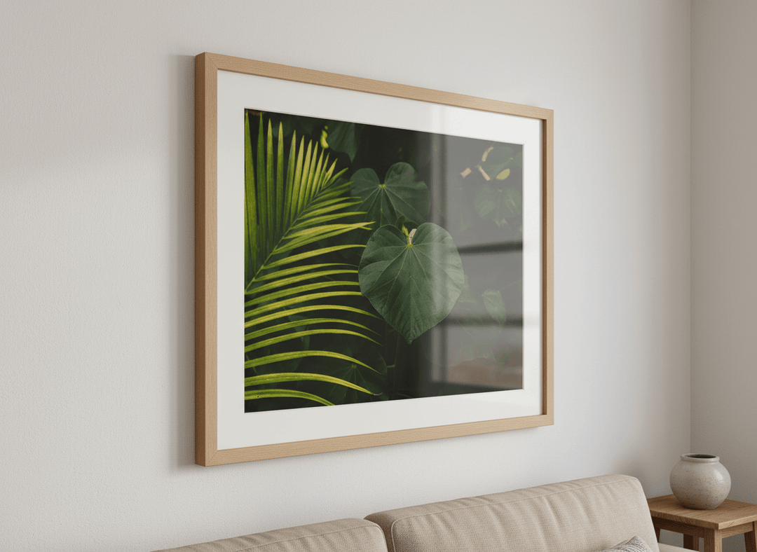 Modern wall art styled above a sofa in a neutral living room