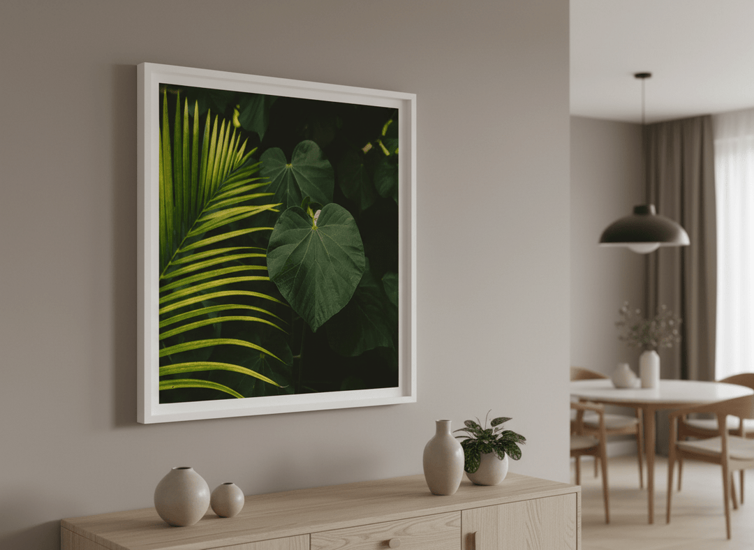 Wall art styled above a dining table in a contemporary home