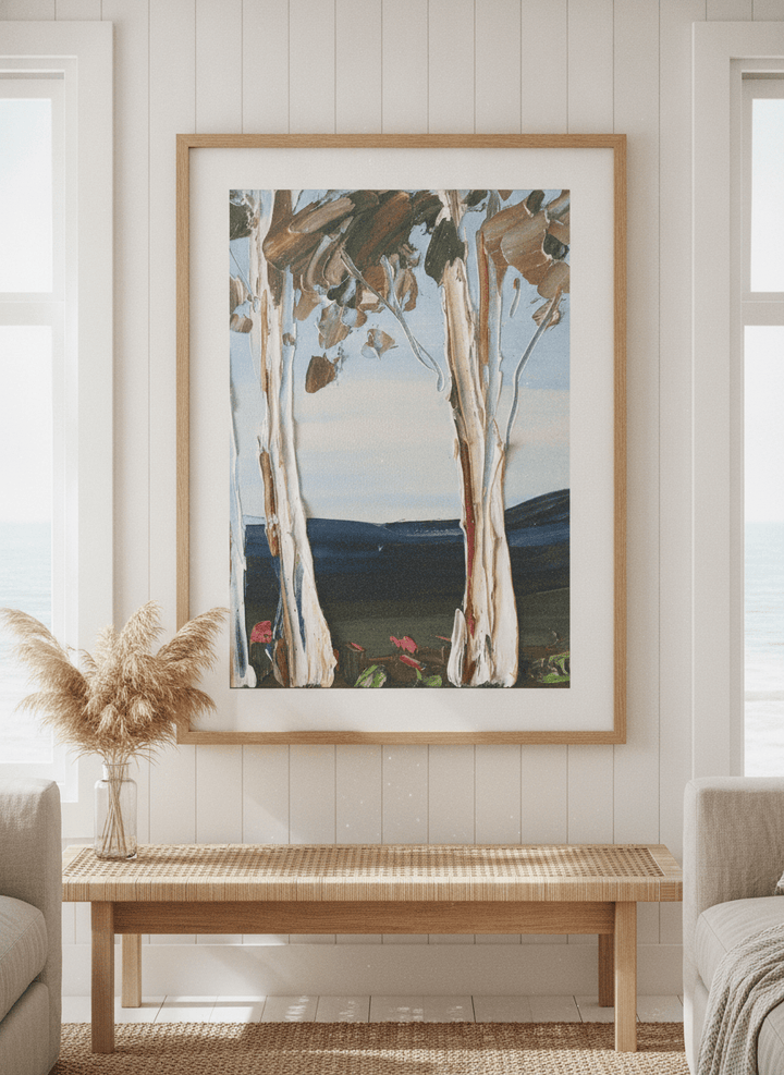 Neutral wall art displayed in a sunny coastal beach house