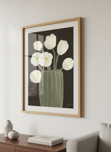 Modern wall art styled above a sofa in a neutral living room