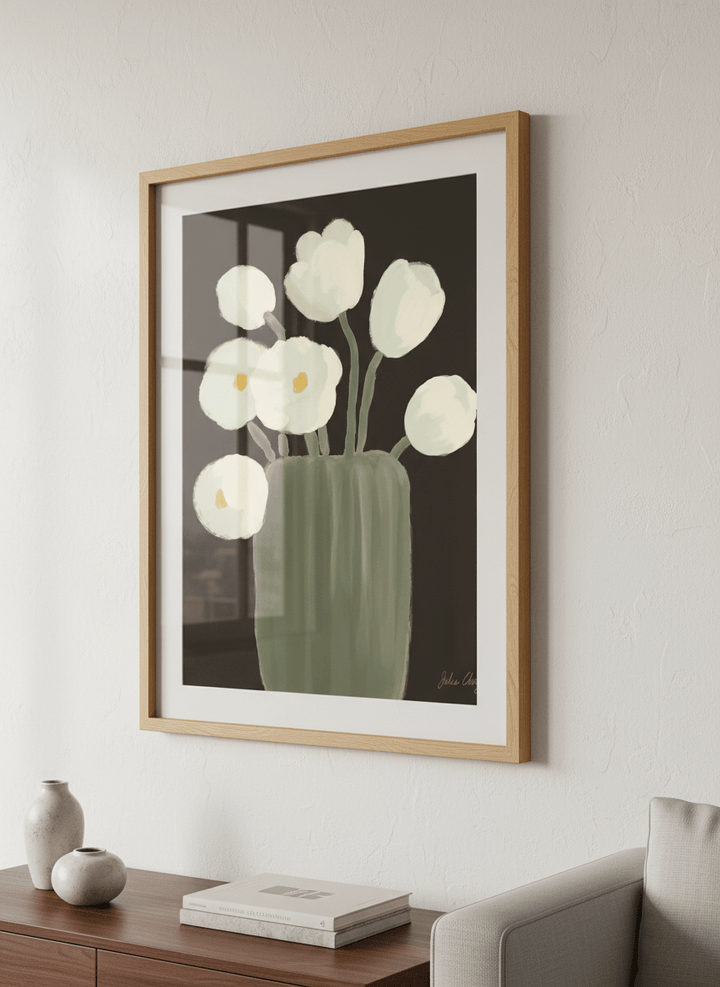 Modern wall art styled above a sofa in a neutral living room