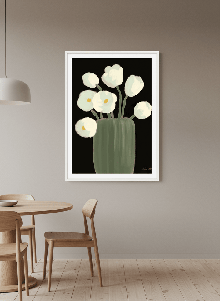Wall art styled above a dining table in a contemporary home