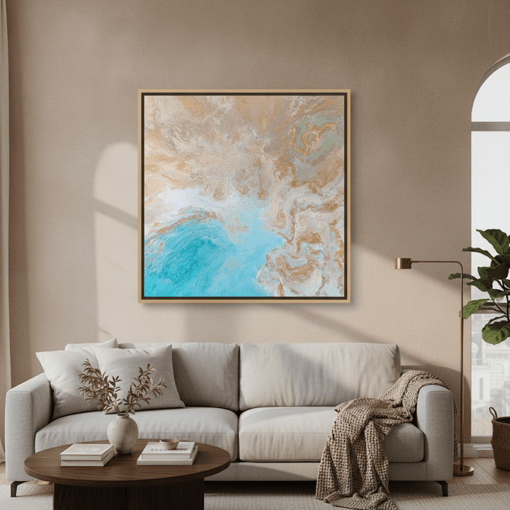 Oversized statement canvas wall art with a natural timber surround styled in a neutral living room