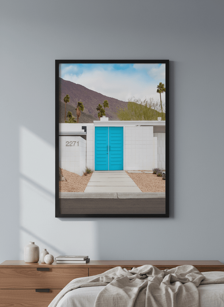 Minimalist artwork displayed in a calm, light-filled bedroom interior