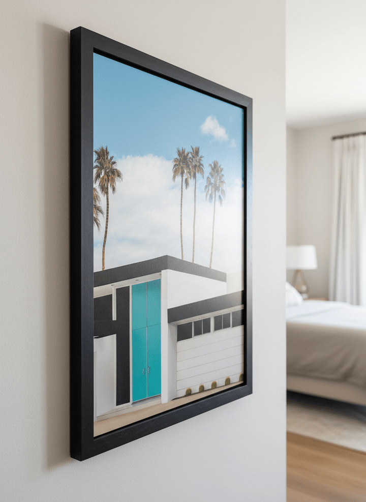 Minimalist artwork displayed in a calm, light-filled bedroom interior