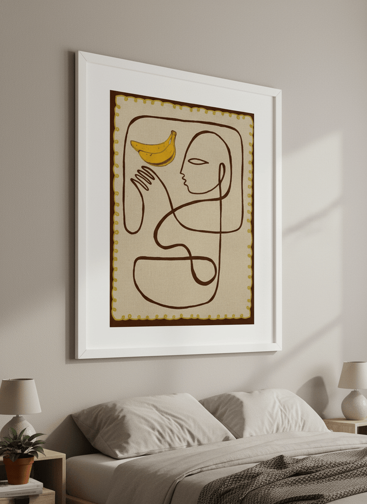 Minimalist artwork displayed in a calm, light-filled bedroom interior