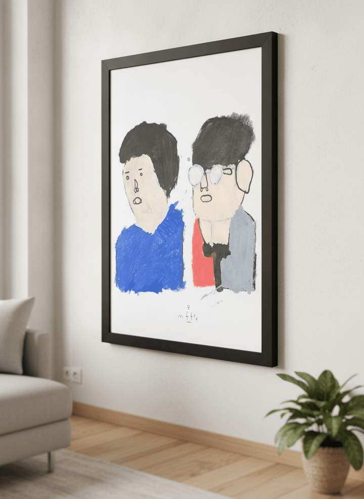 Modern wall art styled above a sofa in a neutral living room