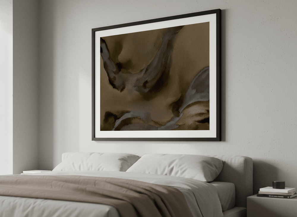 Minimalist artwork displayed in a calm, light-filled bedroom interior