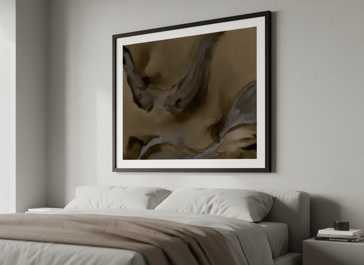 Minimalist artwork displayed in a calm, light-filled bedroom interior