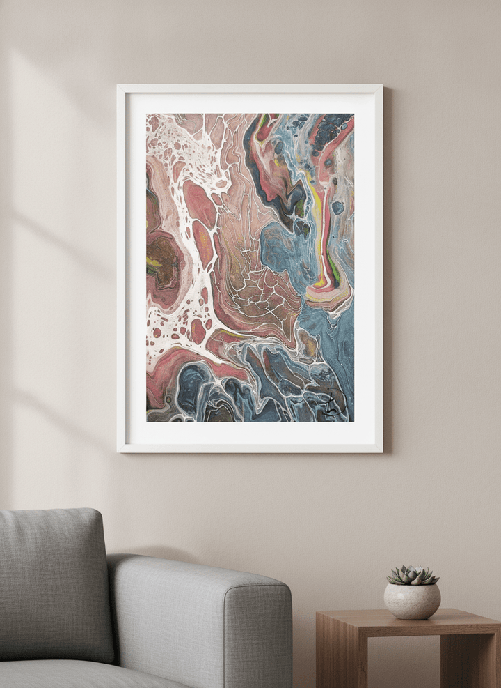 Modern wall art styled above a sofa in a neutral living room