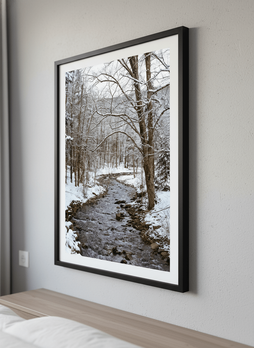 Minimalist artwork displayed in a calm, light-filled bedroom interior