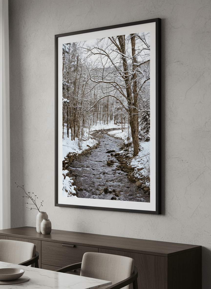 Wall art styled above a dining table in a contemporary home