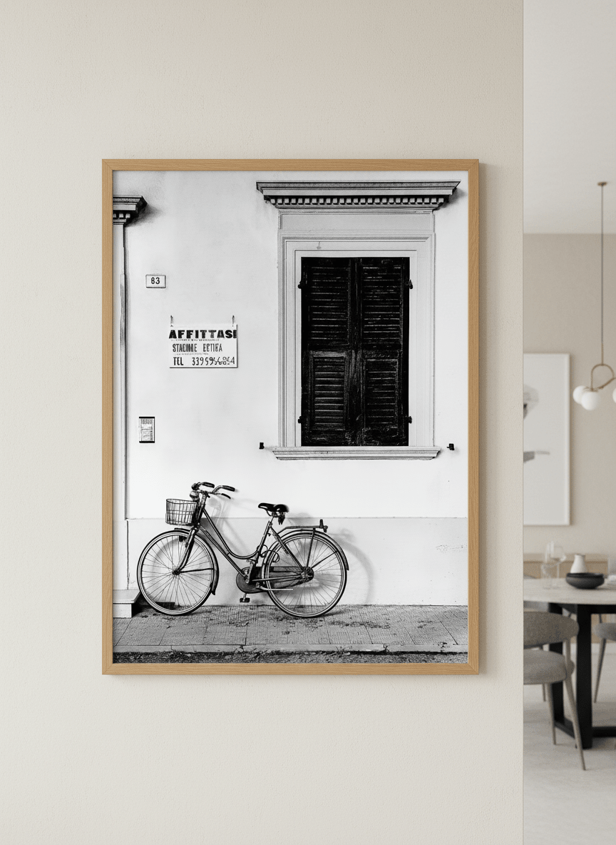 Wall art styled above a dining table in a contemporary home
