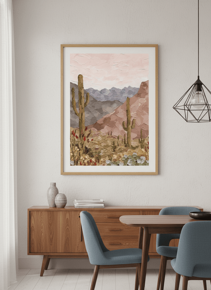Wall art styled above a dining table in a contemporary home