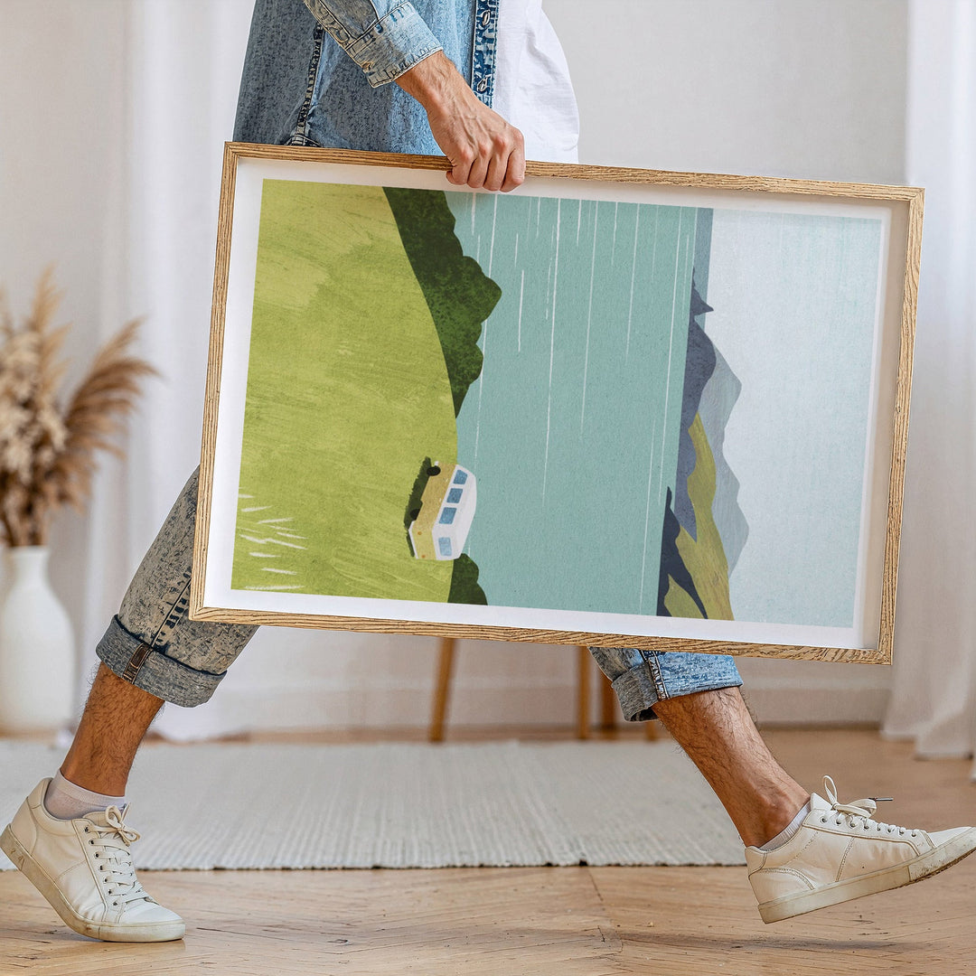 Person holding abstract artwork in a home setting