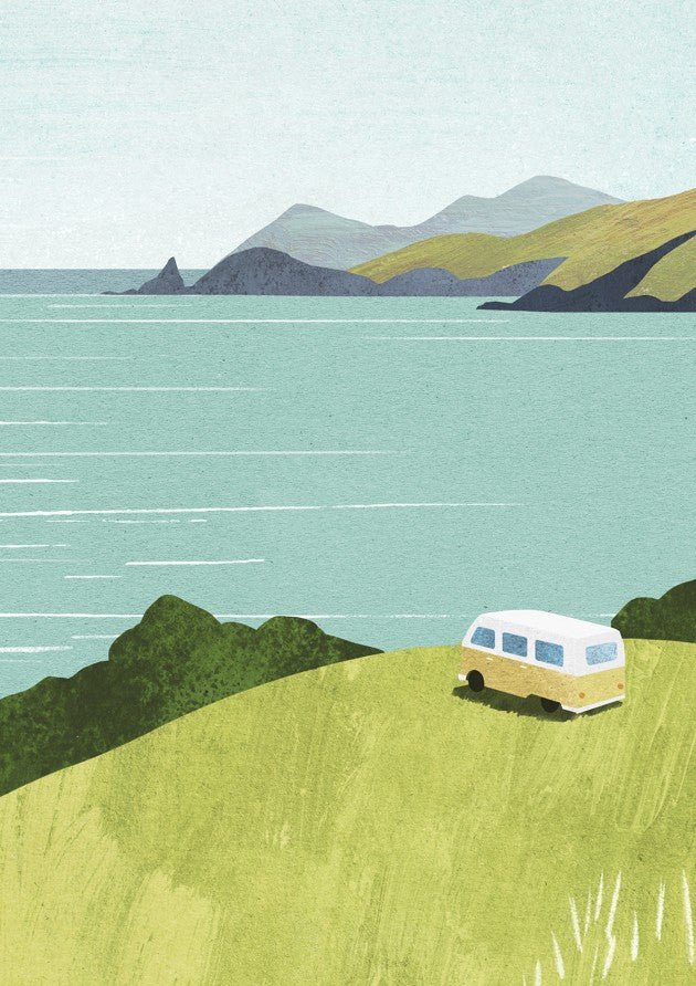 Van parked on a grassy hill overlooking a coastal landscape with mountains. framed