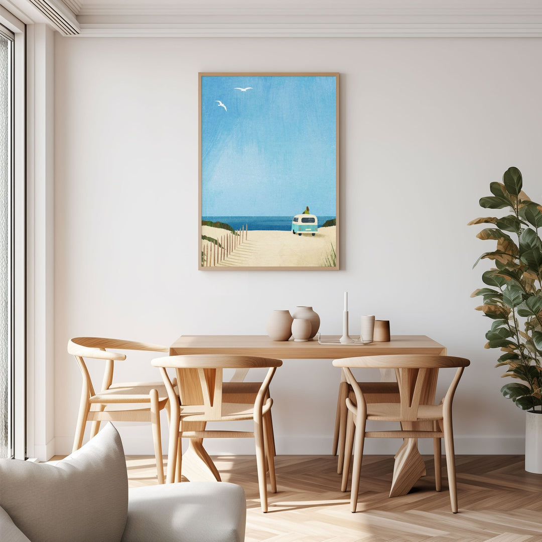 Dining room with wooden table and chairs, beach scene on wall, and plant.