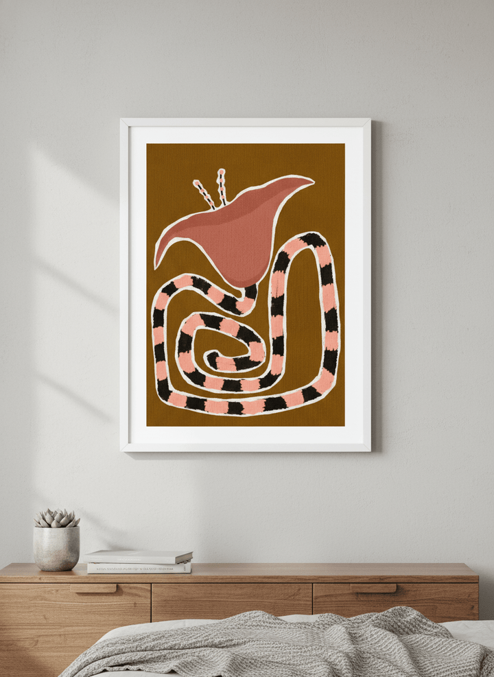 Minimalist artwork displayed in a calm, light-filled bedroom interior