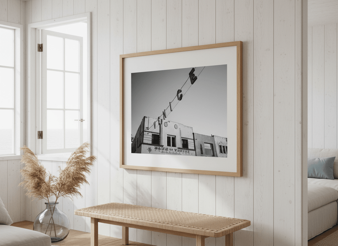 Neutral wall art displayed in a sunny coastal beach house