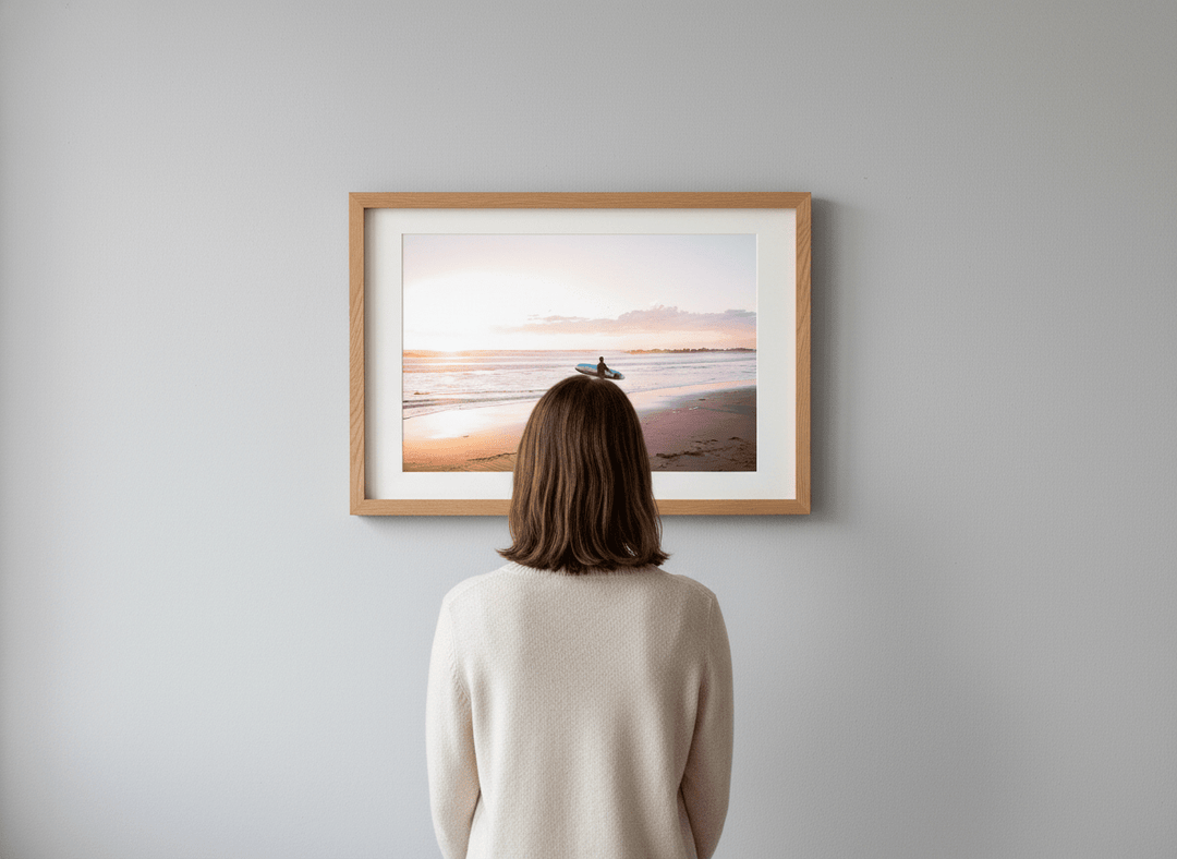Person showcasing the artwork against a clean modern interior wall