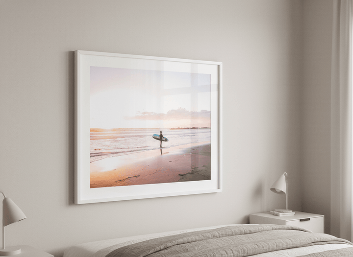 Minimalist artwork displayed in a calm, light-filled bedroom interior