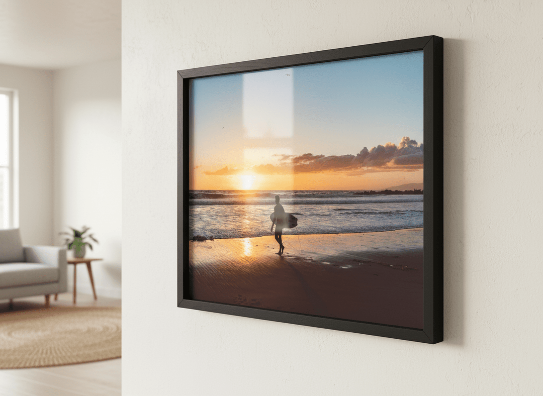 Modern wall art styled above a sofa in a neutral living room