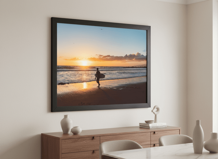 Wall art styled above a dining table in a contemporary home