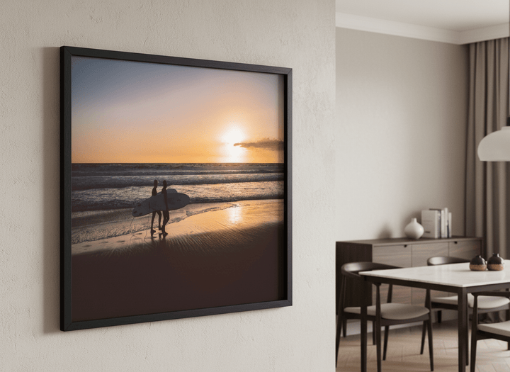 Wall art styled above a dining table in a contemporary home