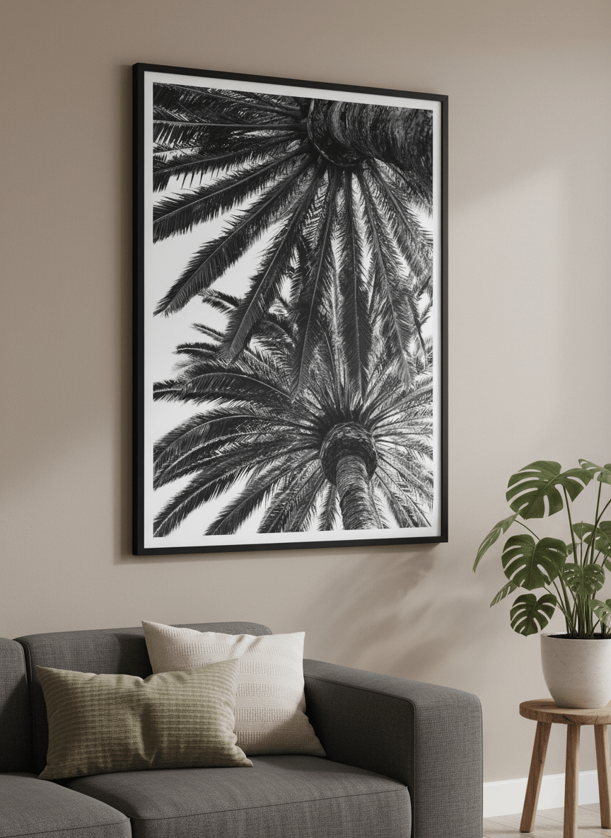 Modern wall art styled above a sofa in a neutral living room