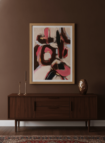 Modern wall art print styled on the wall in a moody living room
